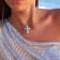 Larimar Oval Cross Rhodium Over Sterling Silver Adjustable Necklace