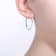 Clear Cubic Zirconia, Rhodium Over Sterling Silver with 3-Stone C-Hoop
Earrings 0.28ctw
