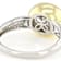 Bezel Set Two-Tone Moissanite Ring In Sterling Silver With 14K Gold Over
Silver Accent
