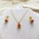 Red Ruby with Moissanite in 14K Yellow Gold Over Sterling Silver Halo
Stud Earrings