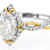 Oval Moissanite Two-Tone Ring In Platinum-Enhanced Sterling Silver With
14k Gold Accents
