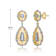 Pear Shape CZ Two-Tone Drop Earrings In 14K Gold Over Brass And Rhodium
Over Brass