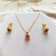 Ruby and Moissanite 14K Yellow Gold Over Sterling Silver Halo Style
Pendant With Chain
