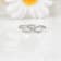 Lab Grown Diamond Rhodium Over Sterling Silver Criss Cross Infinity Ring
VS- GH