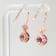Amethyst and CZ 1.59 Ctw Round 18K Rose Gold Over Sterling Silver Drop
Earrings Jewelry.
