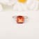 Peach Orange Lab Created Padparadscha Sapphire Rhodium Over Sterling
Silver Three Stone Octagon Ring