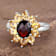 Red Garnet and Yellow Citrine Rhodium Over Sterling Silver Oval Floral
Cocktail Ring 5.5ctw