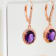 Amethyst and CZ 2.98 Ctw Oval 18K Rose Gold Over Sterling Silver Drop
Earrings Jewelry.