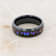 COSMIC Black Tungsten Ring with Crushed Alexandrite and Dark Blue and
Purple Crushed Goldstone 8mm