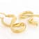 Infinity Hoop Earrings In 18K Gold Over Bronze