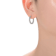 Pave CZ Inside-Out Hoop Earrings In White Rhodium Over Brass