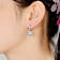 Pear Shape CZ Halo Drop Earrings In Sterling Silver