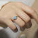 Pear Shape Lab Created Blue Opal and Round Green Nanocrystal Sterling
Silver Opal Ring 3-Stone Ring