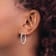 Rhodium Over 14k White Gold 1 1/16" Satin and Diamond-cut Round
Hoop Earrings