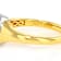 Two-Tone Bezel Set Oval Moissanite Solitaire Ring In 14k Gold Over Silver