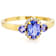 Tanzanite Oval And Round With White Zircon Ring In 18K Gold Over
Sterling Silver 0.86ctw