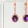 Amethyst and CZ 2.98 Ctw Oval 18K Rose Gold Over Sterling Silver Drop
Earrings Jewelry.
