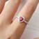 Red Lab Created Ruby Ring With Moissanite Rhodium Over Sterling Silver
Halo Heart Ring