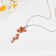 Peach Orange Lab Created Padparadscha Sapphire and CZ Rhodium Over
Silver Pendant Necklace
