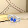14K White Gold Oval Tanzanite and Diamond Ring, 0.85ctw