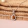 Yellow Pear Shape Citrine Pendant with Moissanite Accents Rhodium Over
Sterling Silver Necklace