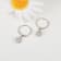 White Lab Grown Diamond Rhodium Over Sterling Silver Teardrop Huggie
Hoop Earrings VS GH
