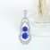 14K White Gold Round Tanzanite and Diamond Pendant 0.79ctw