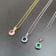 Ruby and Moissanite 14K Yellow Gold Over Sterling Silver Halo Style
Pendant With Chain