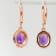 Amethyst and CZ 2.98 Ctw Oval 18K Rose Gold Over Sterling Silver Drop
Earrings Jewelry.