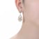 Pear Shape CZ Two-Tone Drop Earrings In 14K Gold Over Brass And Rhodium
Over Brass