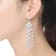 Clear Cubic Zirconia, Rhodium Plated over Sterling Silver Long
Chandelier Earrings