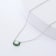 Moissanite Solitaire Rhodium Over Sterling Silver Necklace With Green Enamel