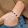 Black Leather and Stainless Steel with Polished Hearts 7.5-inch Bracelet