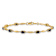 10k Yellow Gold and Rhodium Over 10k Yellow Gold Diamond and Oval
Sapphire Bracelet