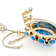 Turquoise Simulant And Crystal Enhancer Pendant With Byzantine Chain In
Gold Tone