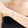Blue Topaz Color CZ Pear Shape Tennis Bracelet In White Rhodium Over Brass
