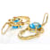 Freeform Dangle With Blue Topaz Earrings In 18K Gold Over Sterling
Silver 13.25ctw