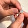 Pear Shape Lab Created Opal with Moissanite Accents Rhodium Over
Sterling Silver Halo Ring
