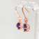 Amethyst and CZ 1.59 Ctw Round 18K Rose Gold Over Sterling Silver Drop
Earrings Jewelry.