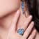 Multi-color Quartz, Blue Topaz and Green Nanocrystal Rhodium Over
Sterling Silver Ring