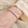 Round Moissanite Rhodium Over Sterling Silver Tennis Bracelet