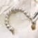 Australian White South Sea Cultured Pearl Baroque Bracelet with 14k
Yellow Gold Clasp