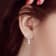 2 1/5 CT DEW Created Moissanite Three-Stone Leverback Earrings in
Sterling Silver