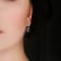 3 5/8 CT TGW Created Blue and White Sapphire Oval Hoop Earrings in
Sterling Silver
