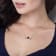 4/5 CT TGW Garnet and 1/10 CT TW Diamond "MOM" Pendant with
Chain in Yellow Plated Sterling Silver