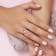 1 1/7 CTW Morganite and White Topaz Open Teardrop Ring in Rose Plated
Sterling Silver