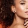 1 1/2 CT TGW Garnet and 1/10 CT TW Diamond Halo Stud Earrings in
Sterling Silver