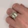 5 5/8 CT TGW Emerald Cut Green Quartz and White Topaz Twist Ring in
Sterling Silver