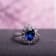 Halo Diamond and 4 CT TGW Created Blue and White Sapphire Ring in
Sterling Silver