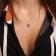 6 CT TGW Amethyst and Diamond Accent Wrapped Pendant with Chain in Rose
Plated Sterling Silver